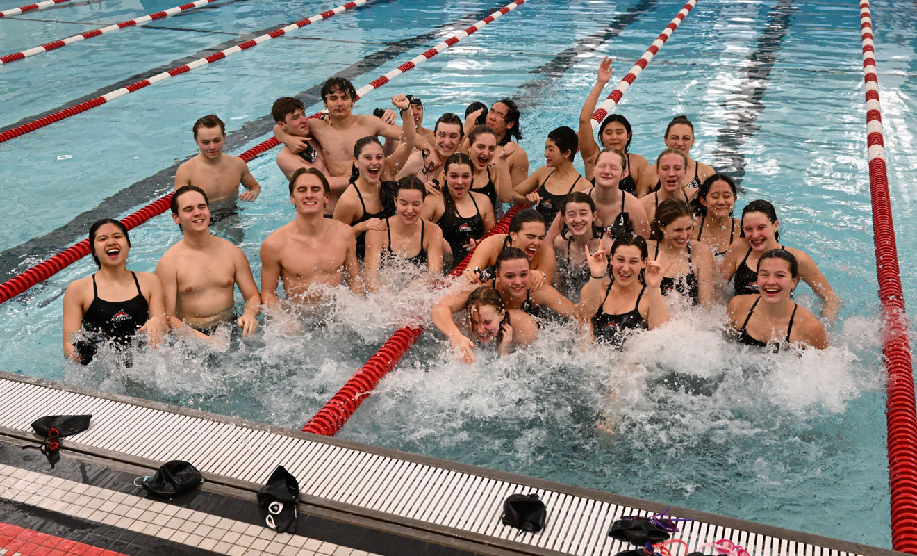 Boys and Girls Swim Teams in water