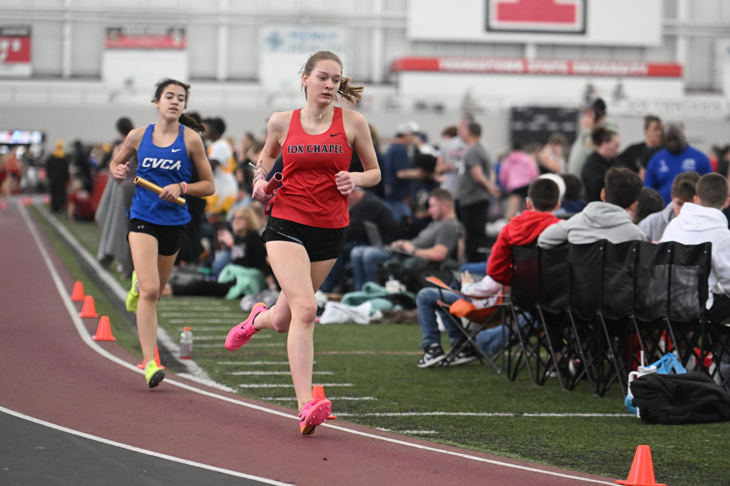 Girl relay runner